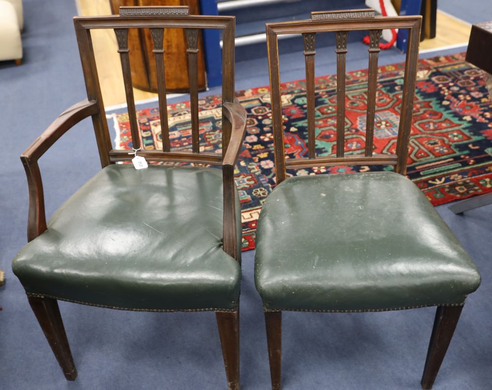 A set of six Hepplewhite style mahogany chairs (two with arms)
